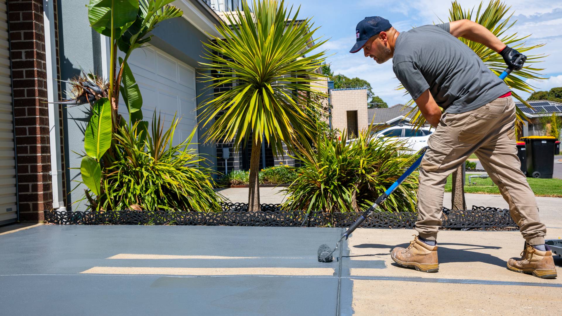 A Melbourne-based concrete resurfacing expert doing some driveway resurfacing