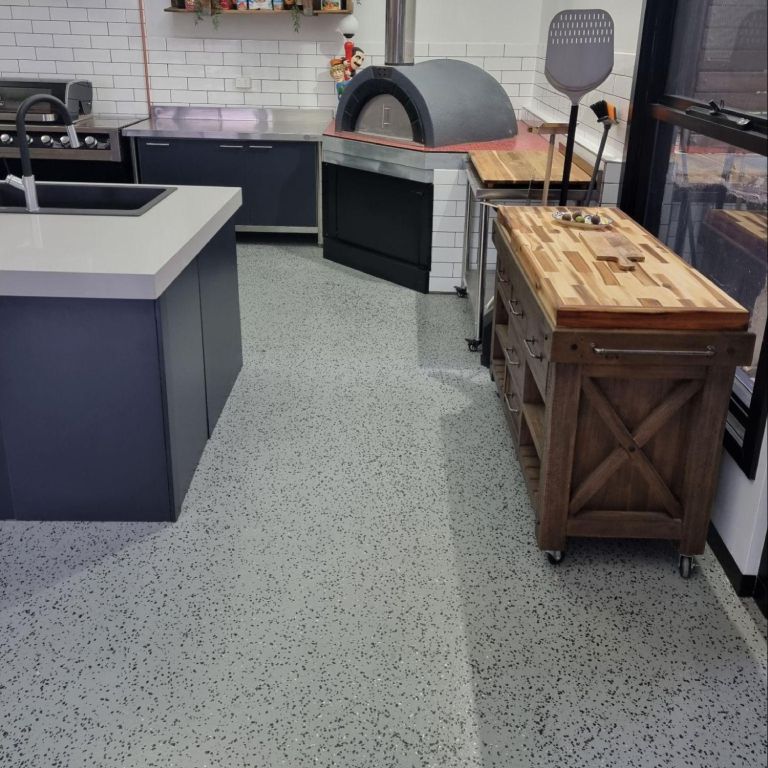 Seamless, non-slip epoxy floor in a back-of-house hospitality space