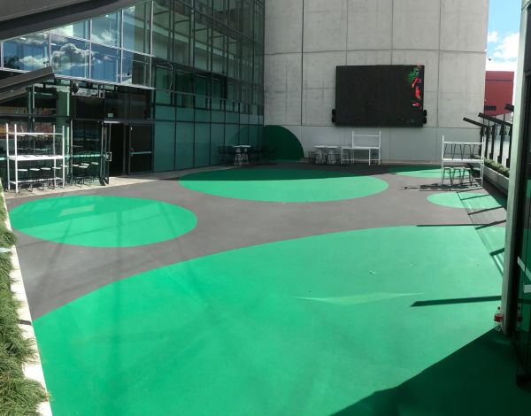 Patterned stencil paving outside a commercial entrance