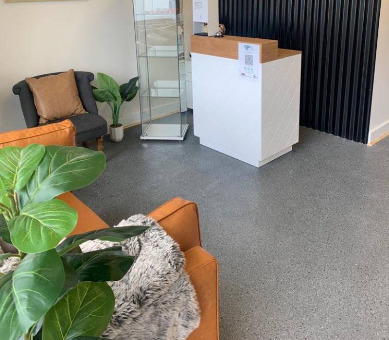 Decorative concrete floor in a modern Melbourne retail showroom