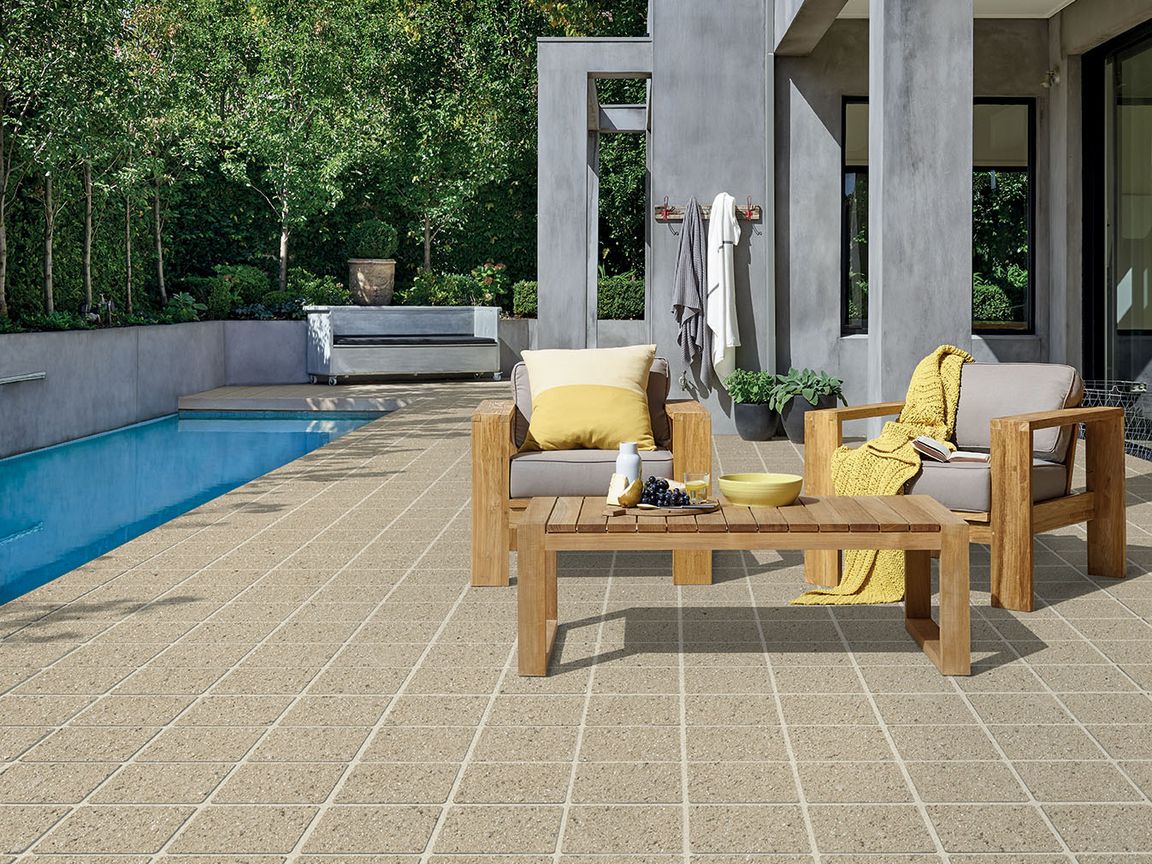 tiles stencil resurfacing concrete around the pool