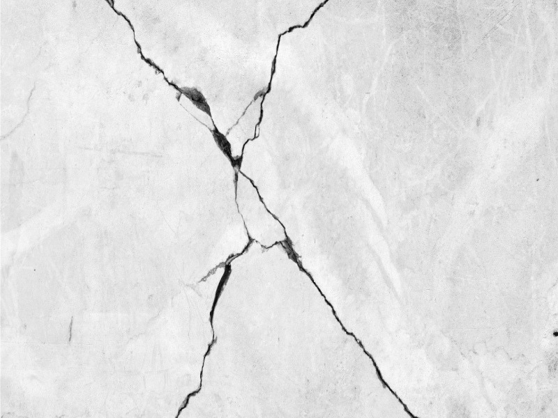 Cracked and faded concrete driveway before resurfacing in Melbourne