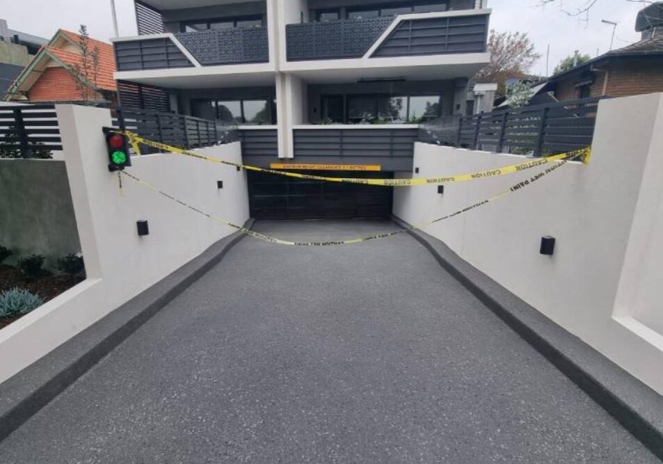 Stencilled concrete driveway in Narre Warren with a cobblestone pattern in charcoal